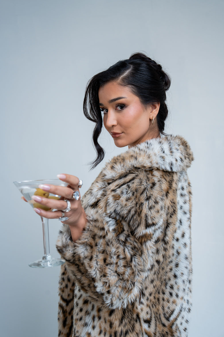 Booked by Muse martini portrait